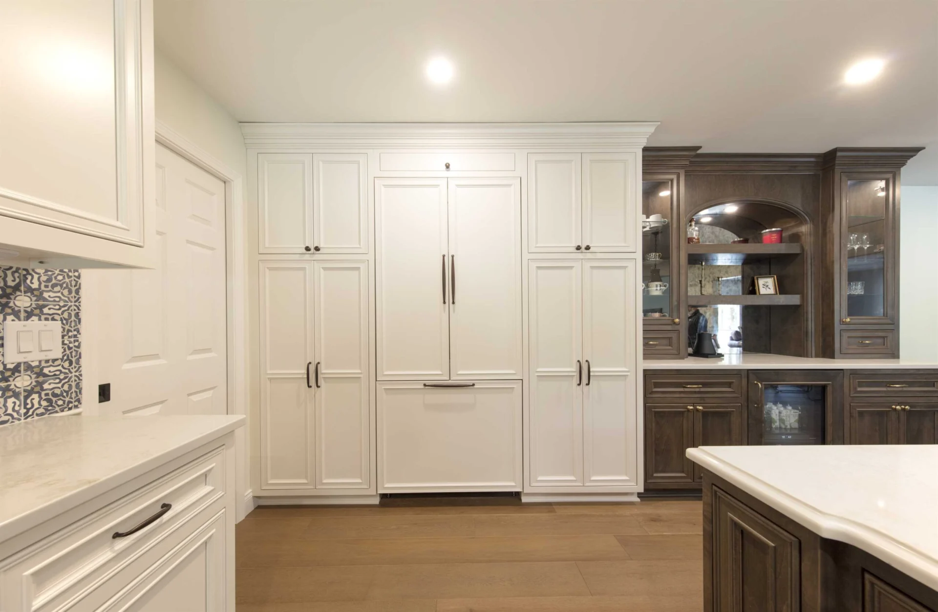 Elegant white and maple kitchen cabinetry built by High Point Cabinets