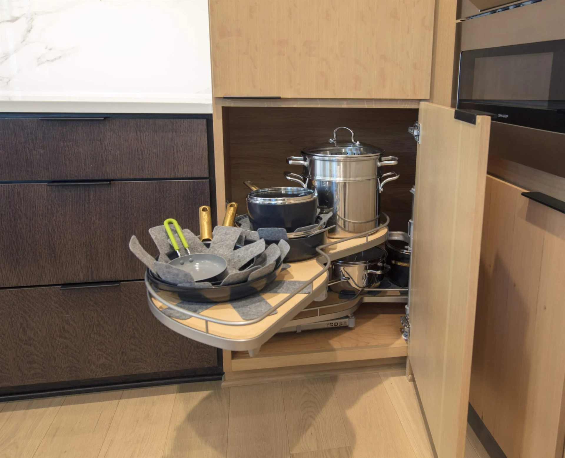 Le Mans corner storage unit fitted into the quarter sawn cabinetry